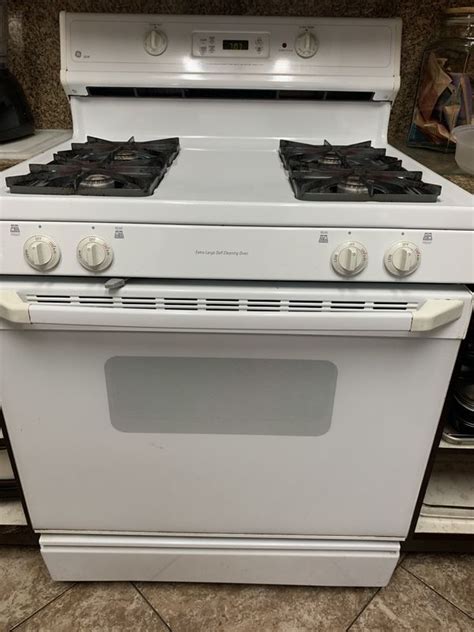ge xl44 lift stove top